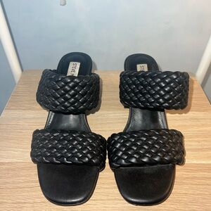 Black Steve Madden heels.